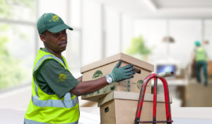 Sandton Office Removals worker loading boxes on Trolley.
