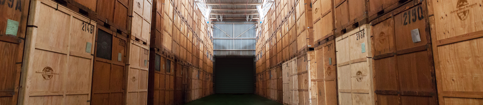 Boxes and crates stored in a warehouse.